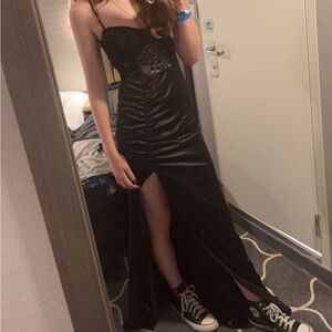 Black corset prom dress. Worn 3 times 0 rips, stains,stretching. Looks brand new